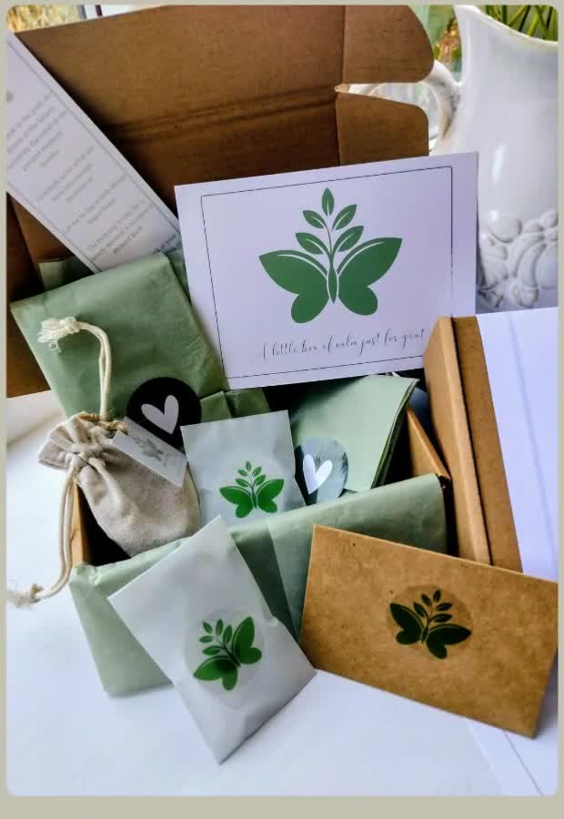 An open Peace and Pause box containing calming handmade gifts